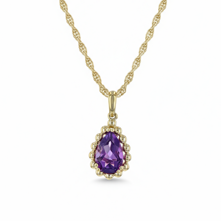 Gold necklace with a purple amethyst pendant on a white background
