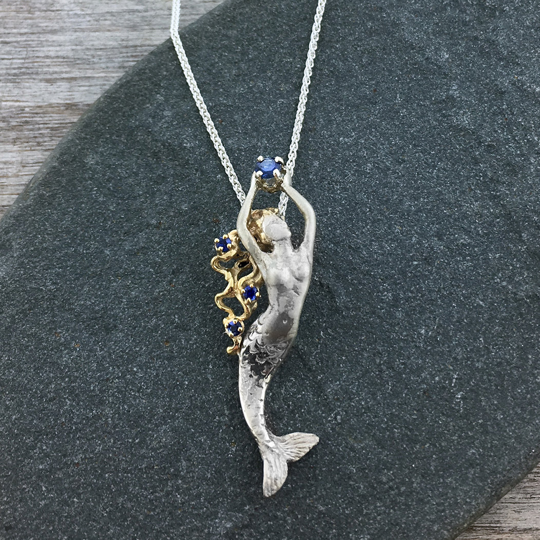 Sterling Silver Fish Hook Blue Sapphire Pendant