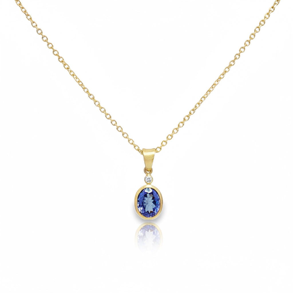 Tanzanite Oval Pendant with diamond accent
