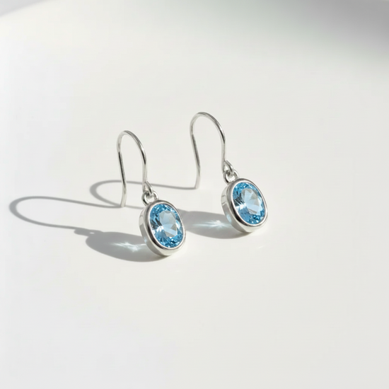 Blue Topaz Silver Bezel Drop Earrings