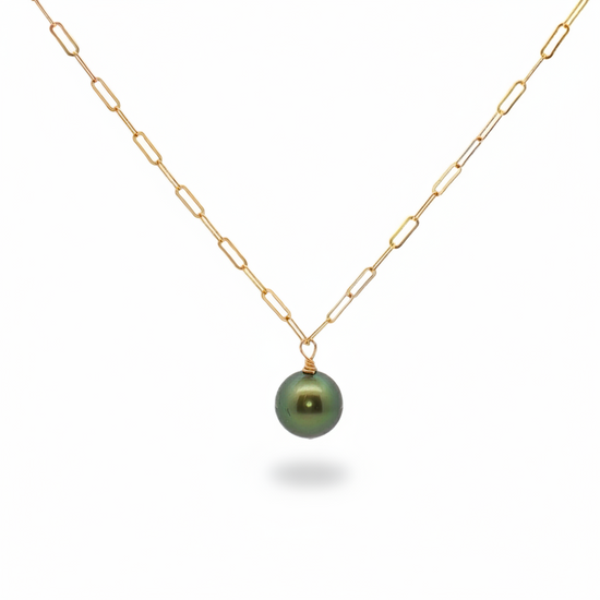 Gold chain necklace with a green pearl pendant on a white background
