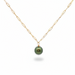 Gold chain necklace with a green pearl pendant on a white background