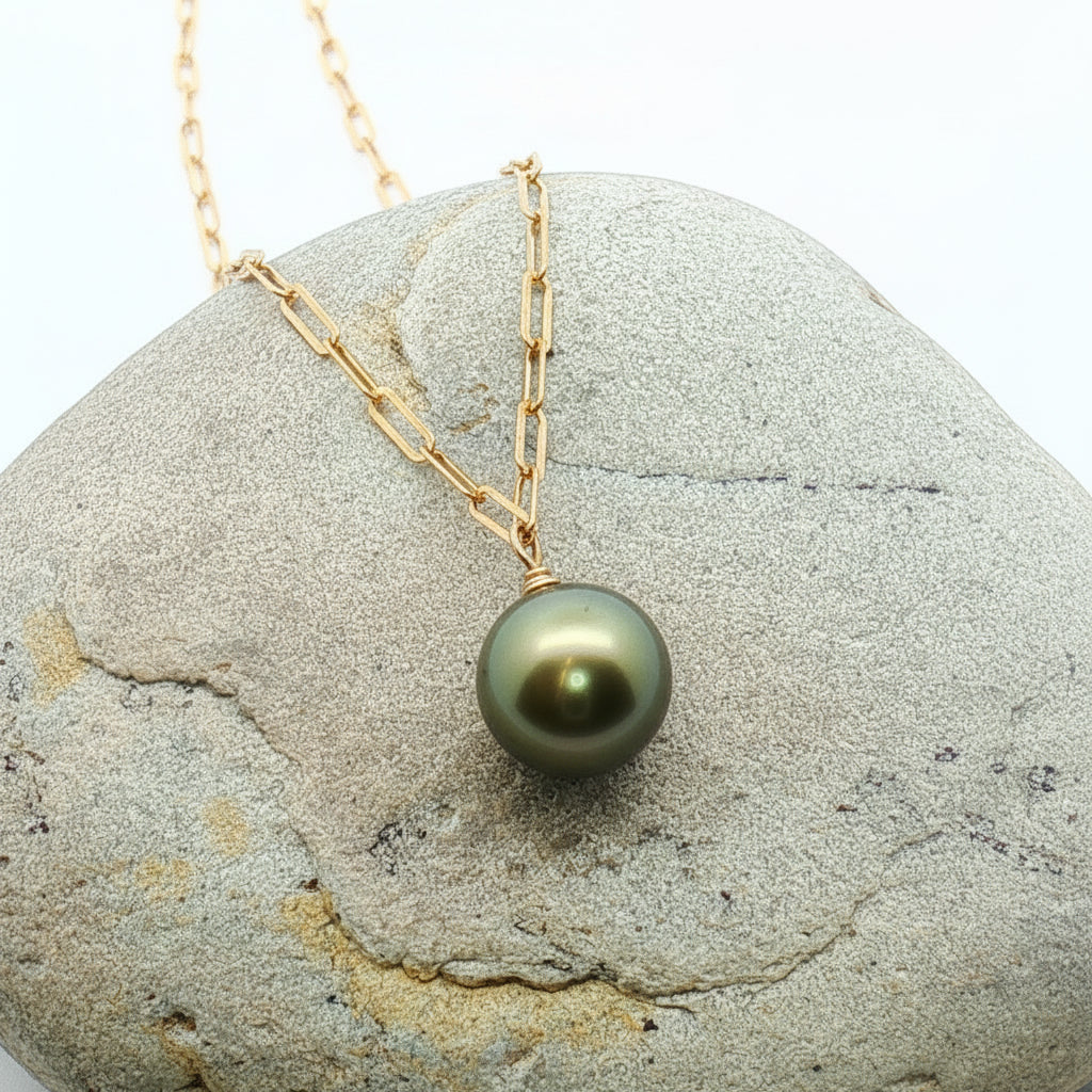 Tahitian Pearl Paperclip chain necklace on a beach stone