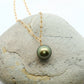 Tahitian Pearl Paperclip chain necklace on a beach stone