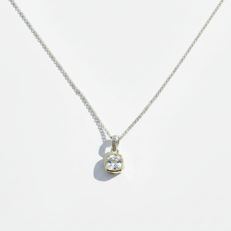 Two tone sterling silver and 14k gold necklace with clear white topaz pendant on a straight chain