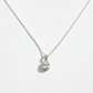 Two tone sterling silver and 14k gold necklace with clear white topaz pendant on a straight chain